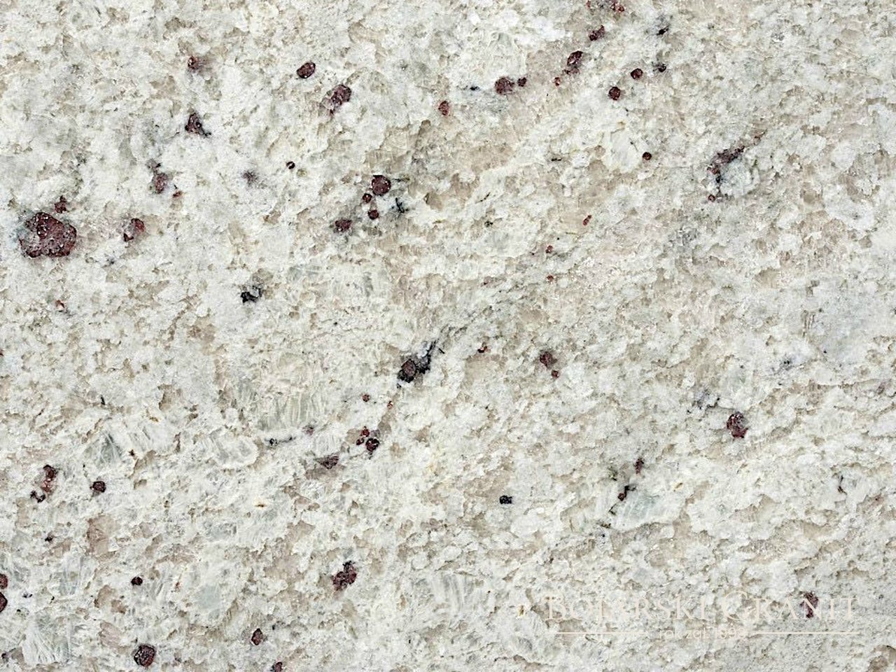 Granit "Victoria White" – jasny granit z czerwonymi, szarymi i grafitowymi minerałami